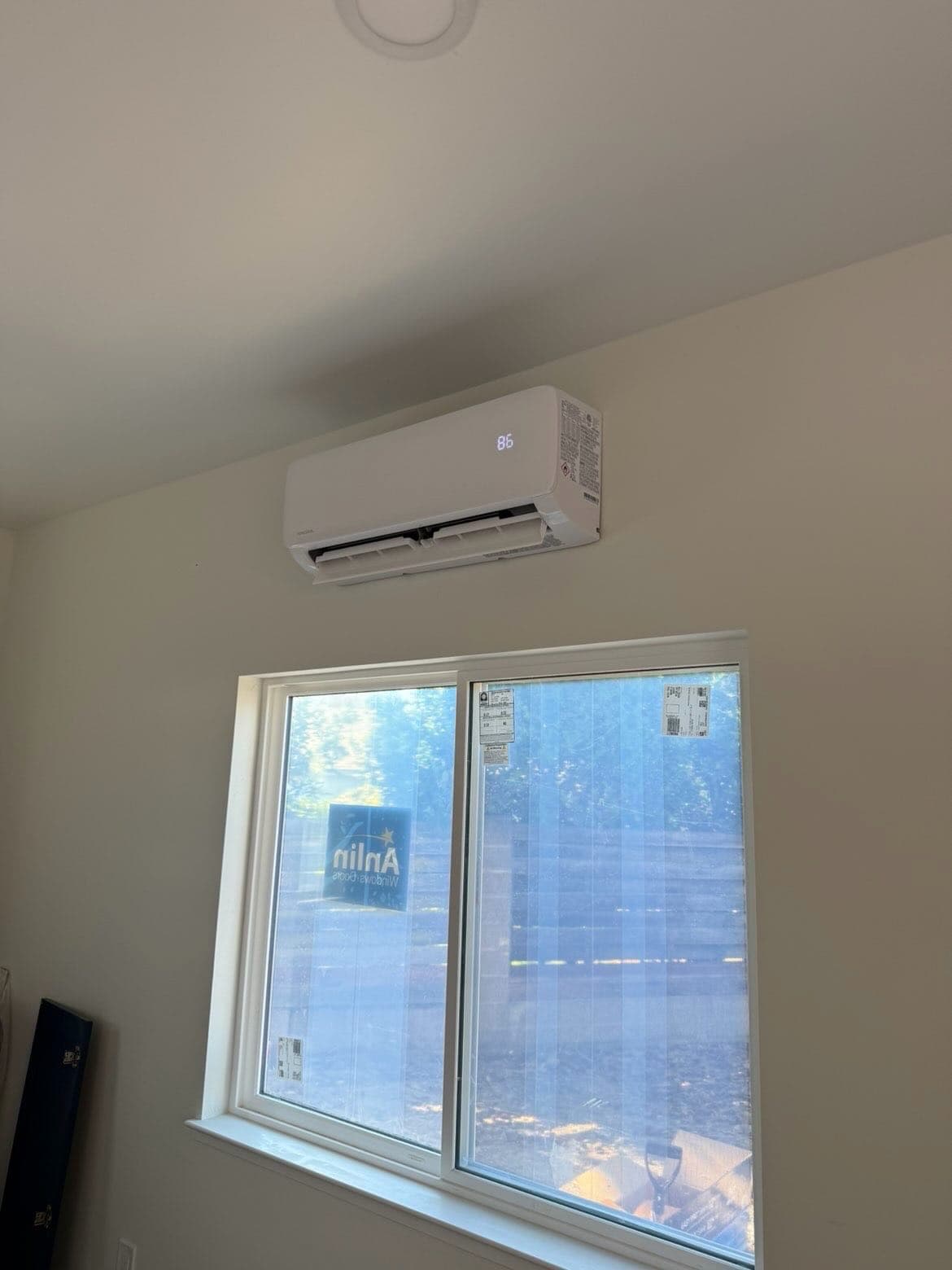Ductless mini-split head installed on an interior wall.